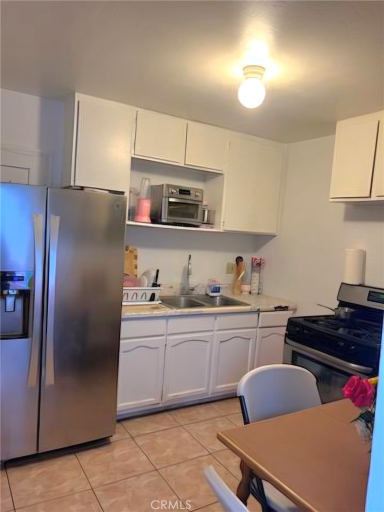 1715 E 70th, Los Angeles CA, 9000164066244121091121
